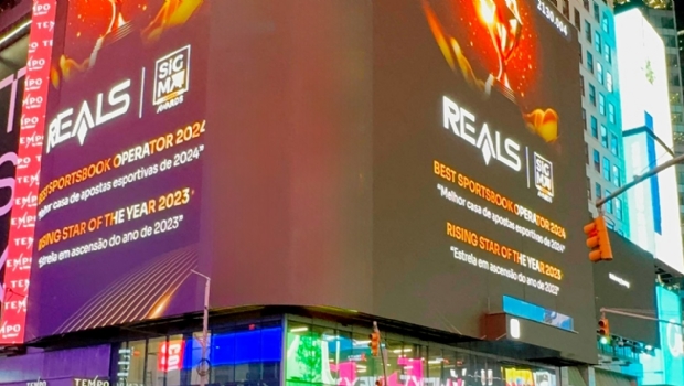 Reals celebrates award won with big screen projection in Times Square, New York